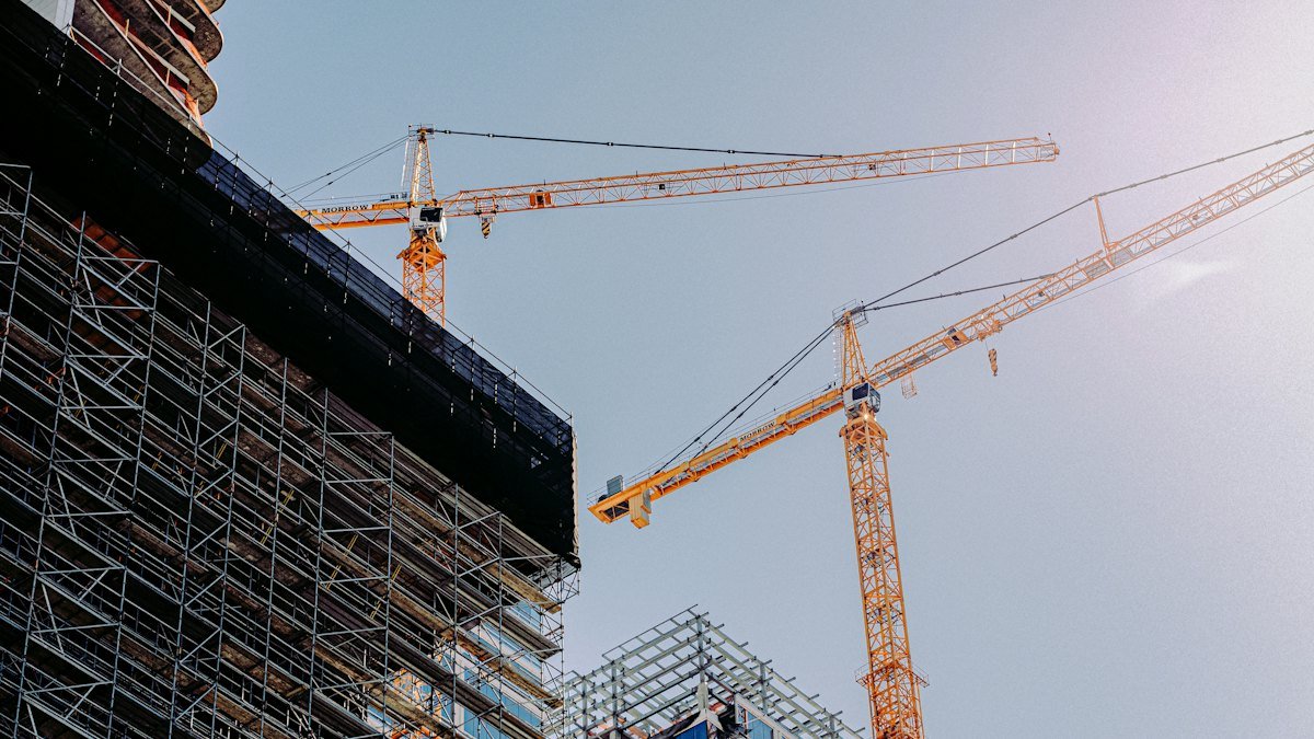 Crane on a construction site – construction company website design in the UAE