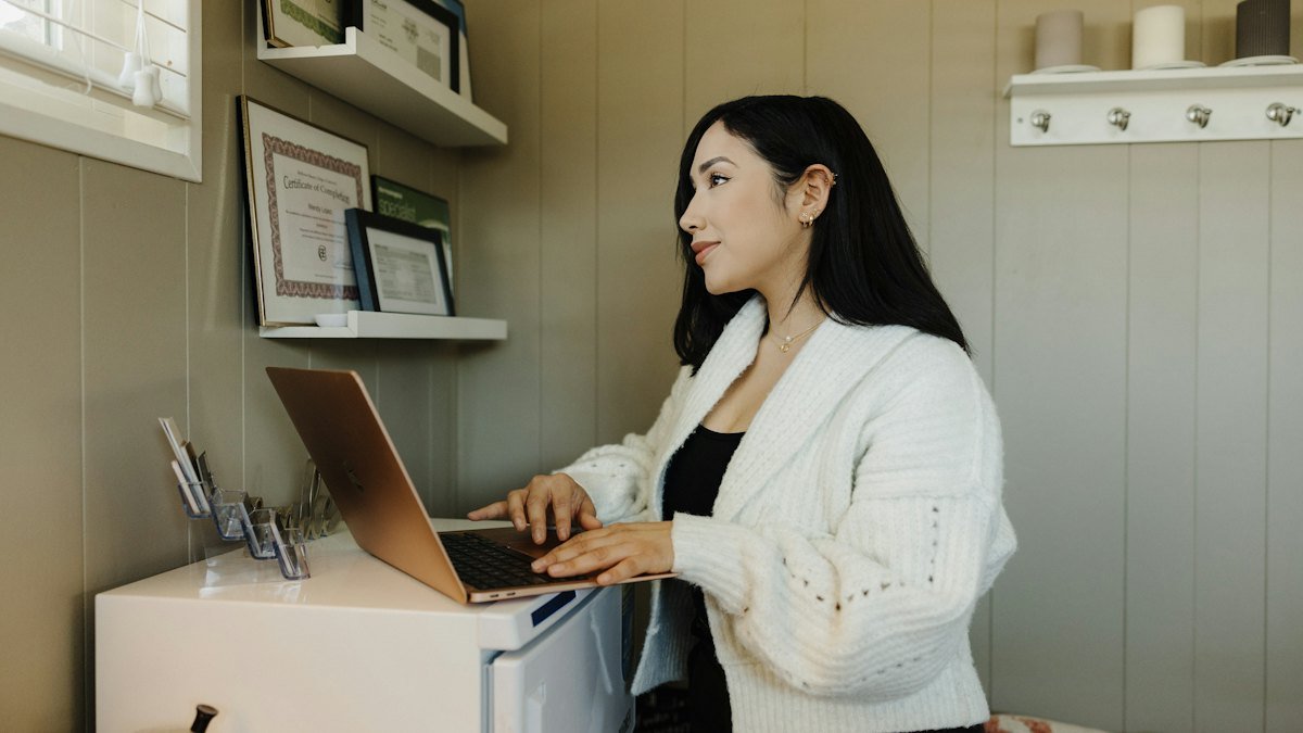 Small business owner working on a laptop – small business websites in Australia