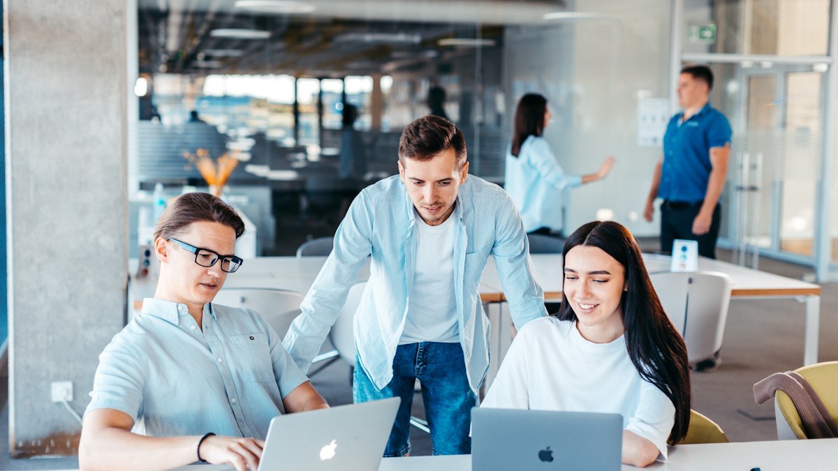 Team planning a project on laptops – website, SEO and CRM prices in the UAE
